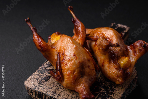 Tela Roasted quail, partridge or pigeon stuffed with orange with spices and herbs