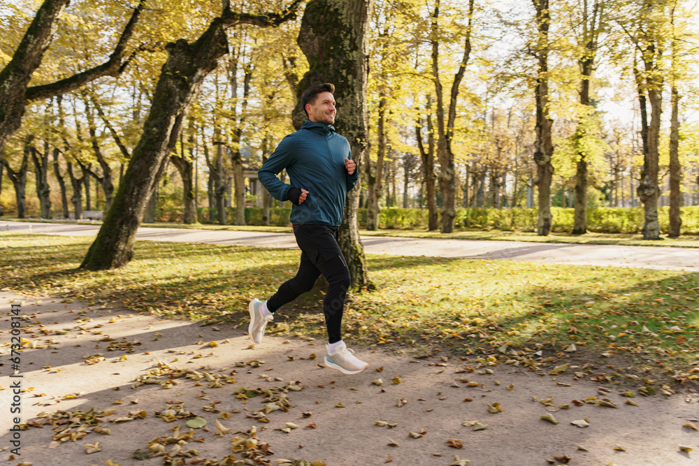 Fototapeta premium A hardy man doing a long daily workout, an active lifestyle, a man in sports clothes.