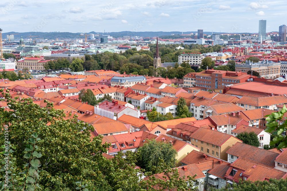 Gothenburg, Sweden: Aerial view of the Haga church (Hagakyrkan) in Gothenburg, Sweden surrounded by red rooftops and green trees