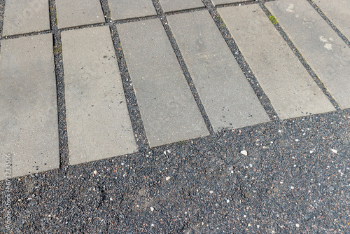 part of the pedestrian road is made of tiles