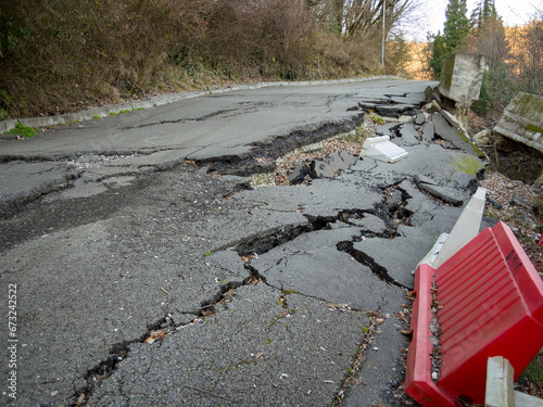 Sliding edge of a road on a slope in a mountainous area