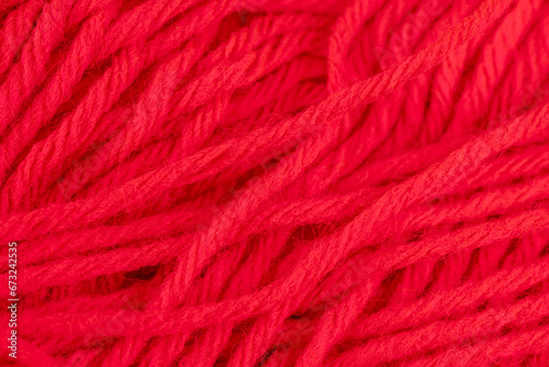 woolen threads of red color for knitting knitting close-up