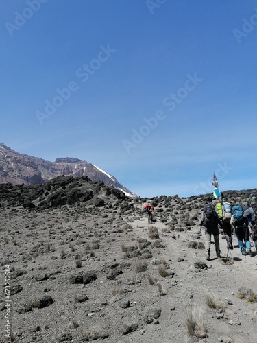 Trekking at high altitude above the clouds on the Machame Route of Mount Kilimanjaro in Tanzania, Africa