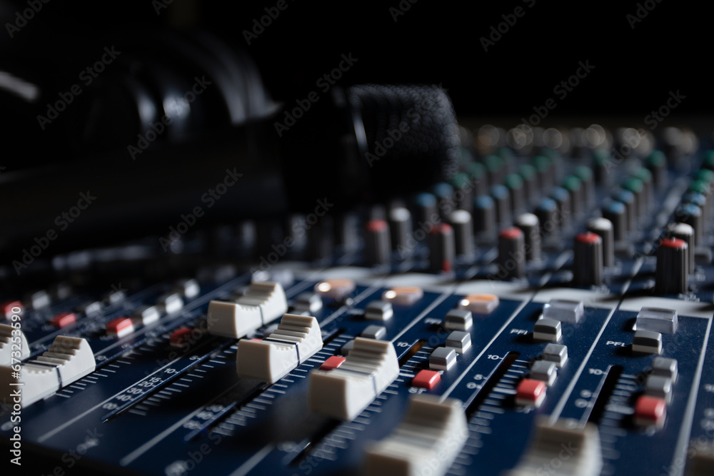 Obraz premium Microphone with audio mixer in the control room audio system.