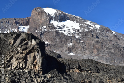 Hiking at high altitude above the clouds on Mount Kilimanjaro in Africa