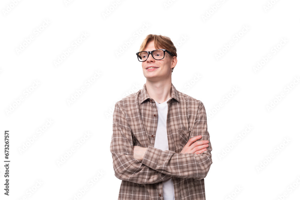 young stylish european student man with golden hair wearing glasses and a plaid shirt young stylish european student man with golden hair wearing glasses and a plaid shirt