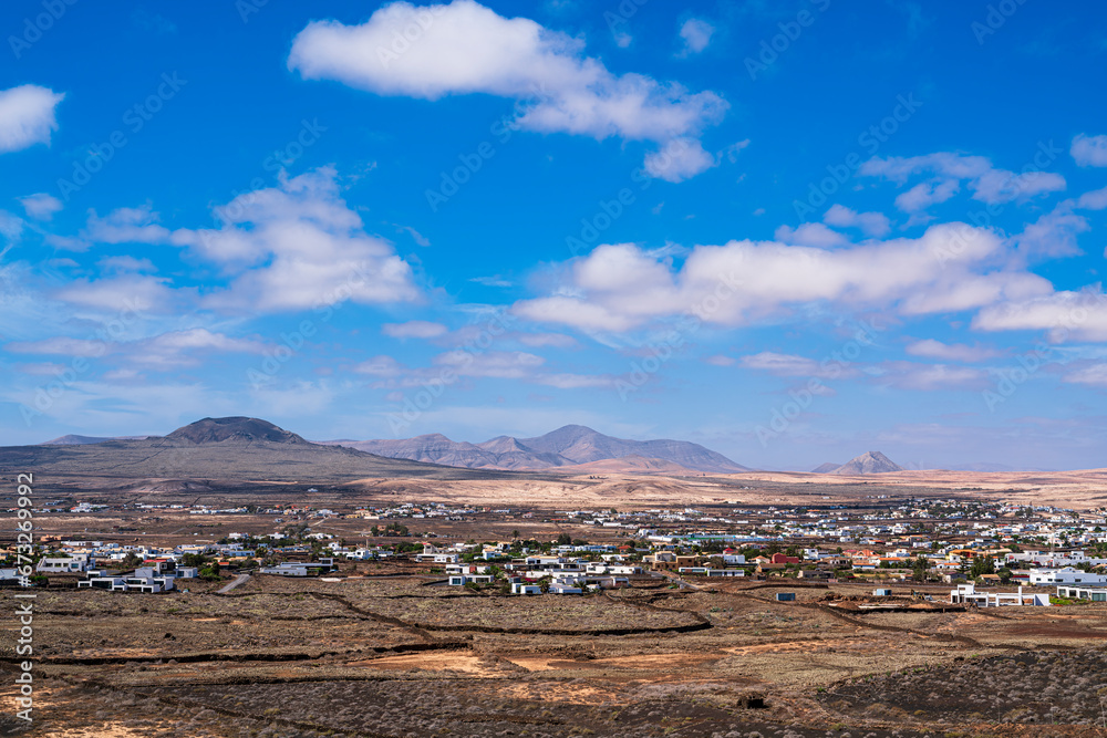 View of the town of Lajares and the surrounding volcanoes. Photography taken in Fuerteventura, Canary Islands, Spain.