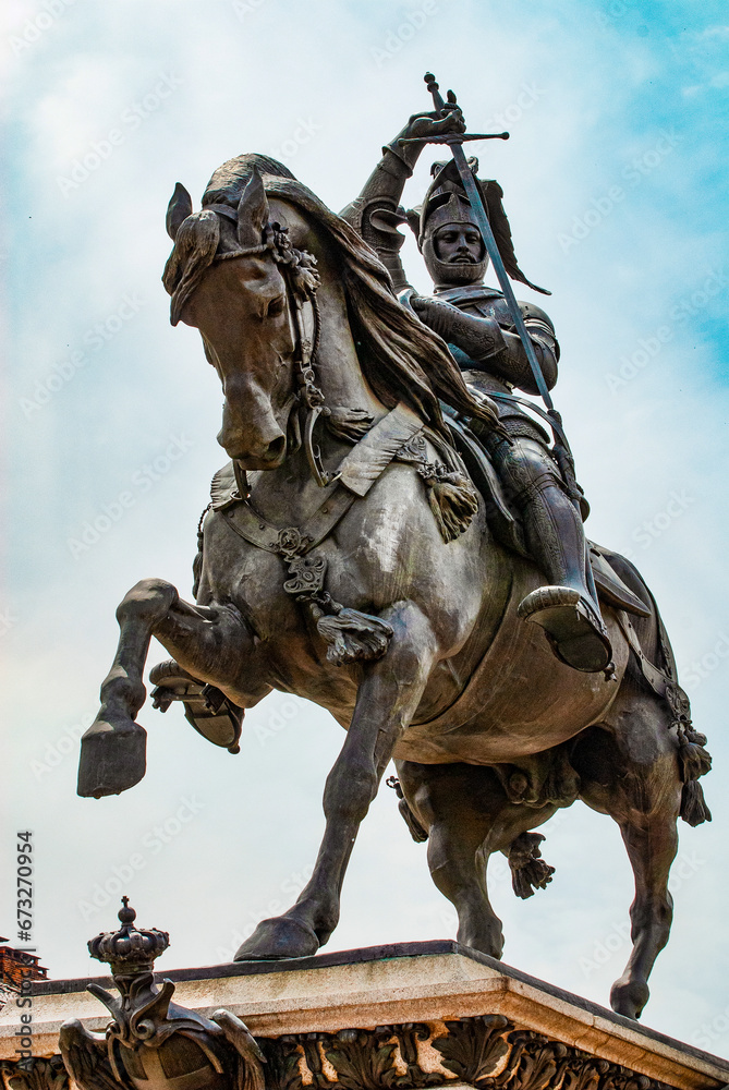 Obraz premium The Caval 'd brons, equestrian statue of Emmanuel Philibert, Duke of Savoy, by Carlo Marochetti (1838), is located at the center of the San Carlo square, Piazza San Carlo. Turin, Piedmont, Italy, Euro