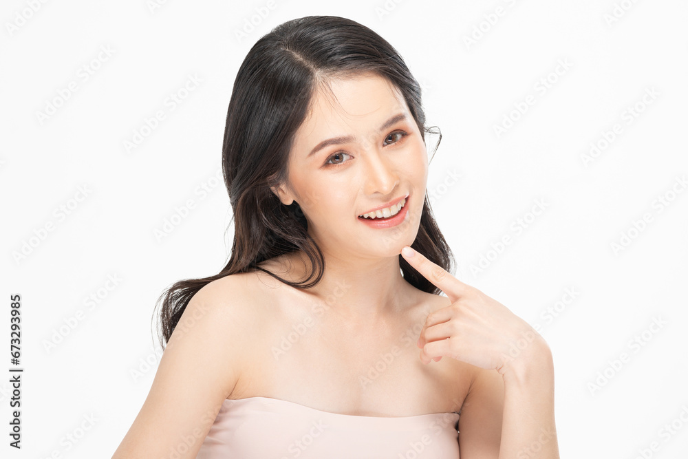 Beautiful Asian young woman touching soft cheek smile with clean fresh skin Happiness and cheerful with positive emotional,isolated on white background,Beauty Cosmetics and Facial treatment Concept Beautiful Asian young woman touching soft cheek smile with clean fresh skin Happiness and cheerful with positive emotional,isolated on white background,Beauty Cosmetics and Facial treatment Concept
