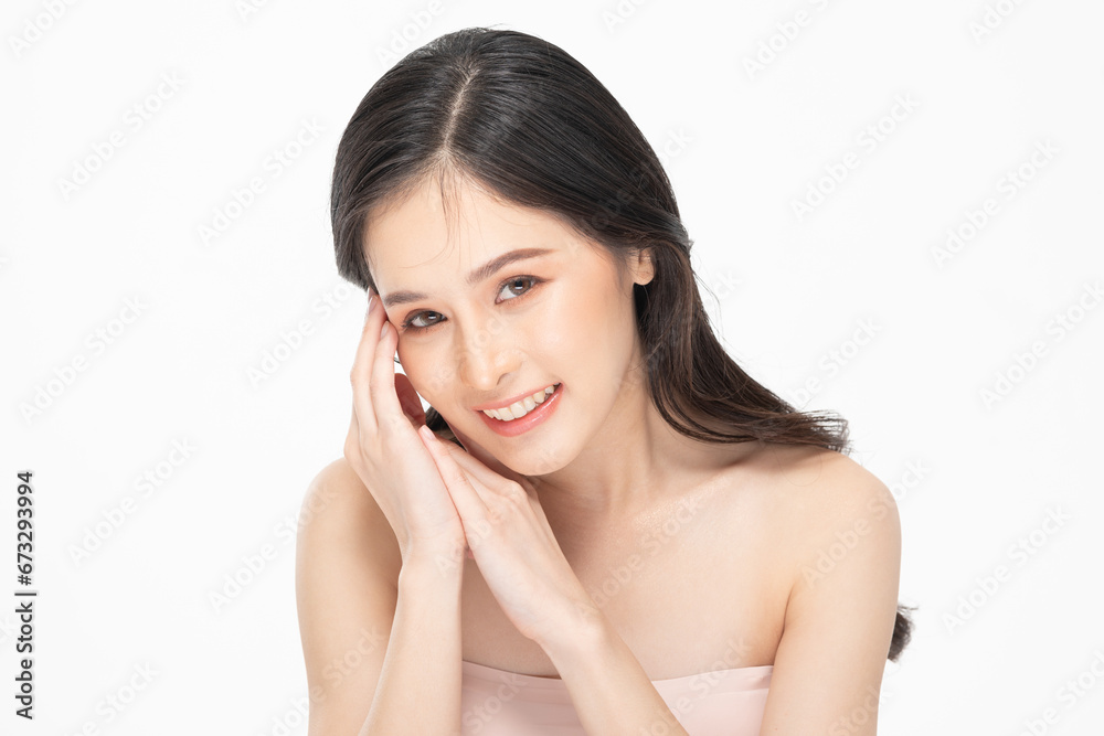 Beautiful Asian young woman touching soft cheek smile with clean fresh skin Happiness and cheerful with positive emotional,isolated on white background,Beauty Cosmetics and Facial treatment Concept Beautiful Asian young woman touching soft cheek smile with clean fresh skin Happiness and cheerful with positive emotional,isolated on white background,Beauty Cosmetics and Facial treatment Concept