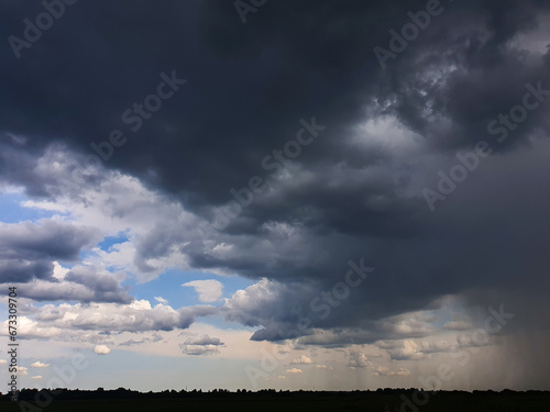 the movement of clouds over an agricultural field with wheat.