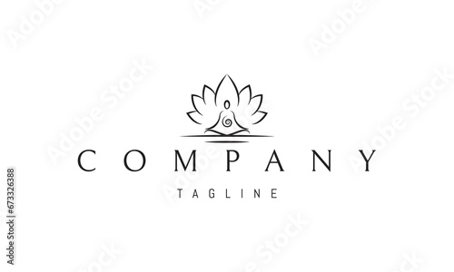 A vector logo with an abstract image of a meditating man on a background of lotus petals.