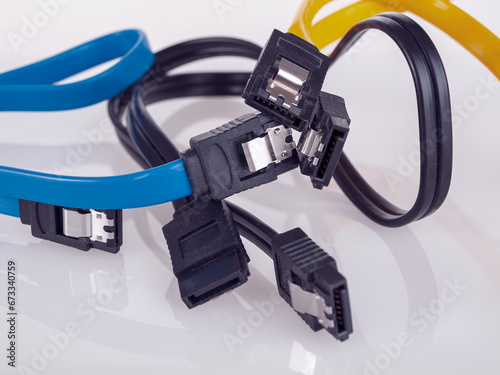 sata cable for connecting hard drives and ssd drives to a computer for data storage photo