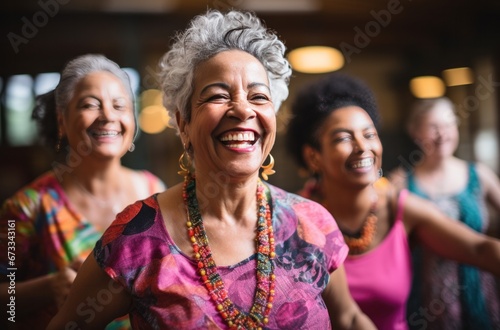 elderly woman in pink shirt dancing with her friends