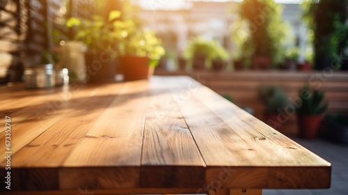 Close up wide wooden counter in modern kitchen interior, sunny day.