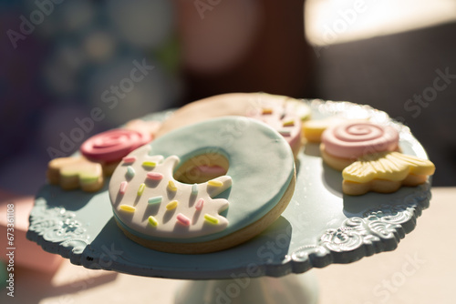 Donuts biscuits decorated with chocolate and sweet and colorful sprinkles