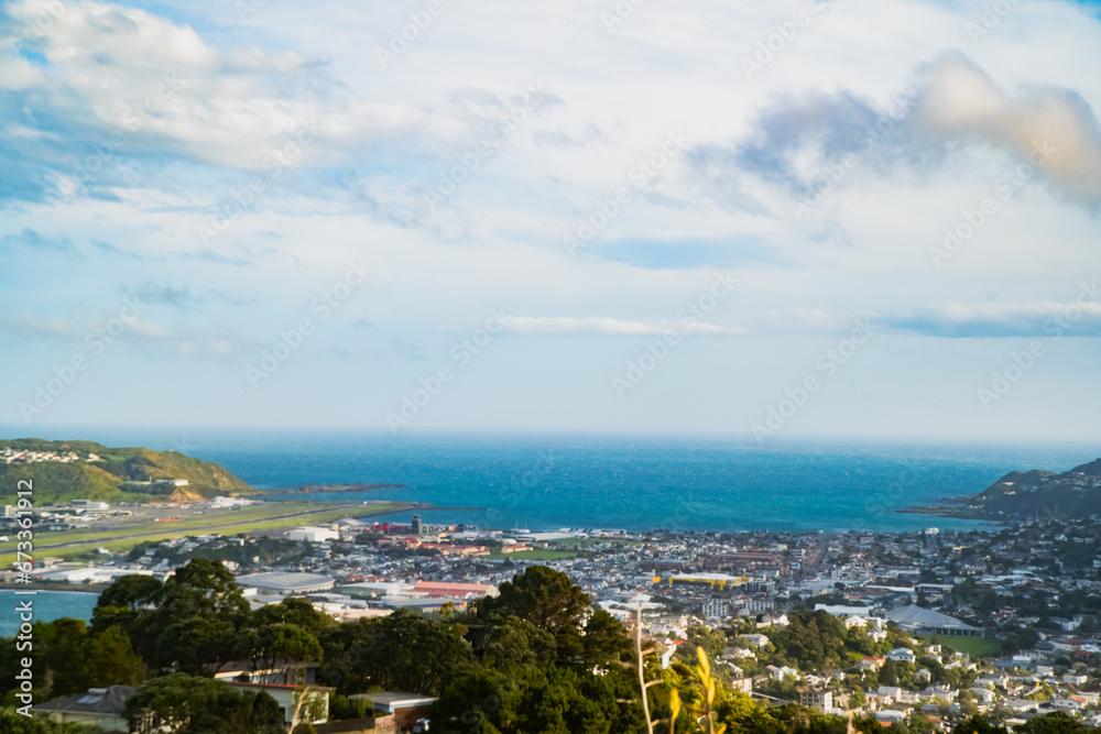 Wellington city in NZ near the airport, with the blue ocean and strong winds
