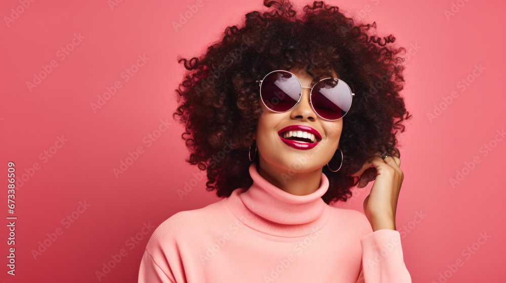 A chic woman of color posed in fashionable, vintage-style glasses, rocking an edgy ensemble. A chic woman of color posed in fashionable, vintage-style glasses, rocking an edgy ensemble.