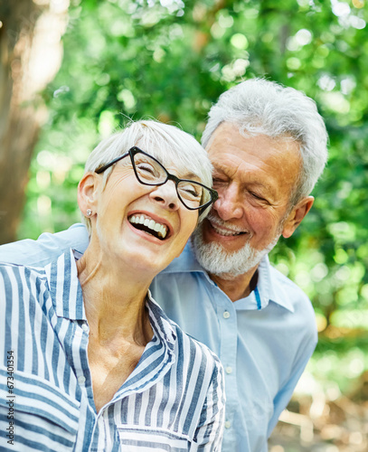 woman man senior couple happy retirement together elderly active vitality park fun smiling love old nature wife happiness mature hug park outdoor