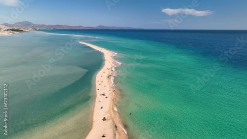 Aerial view of golden sand and crystal sea water on the Canary Island Fuerteventura, Spain. Beach Playa de Sotavento photo