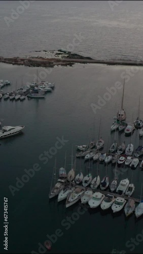 Sicilian harbor full of yachts in the morning