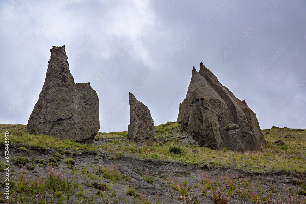 Big lumps of rock in the green valley, North Caucasus, Russia