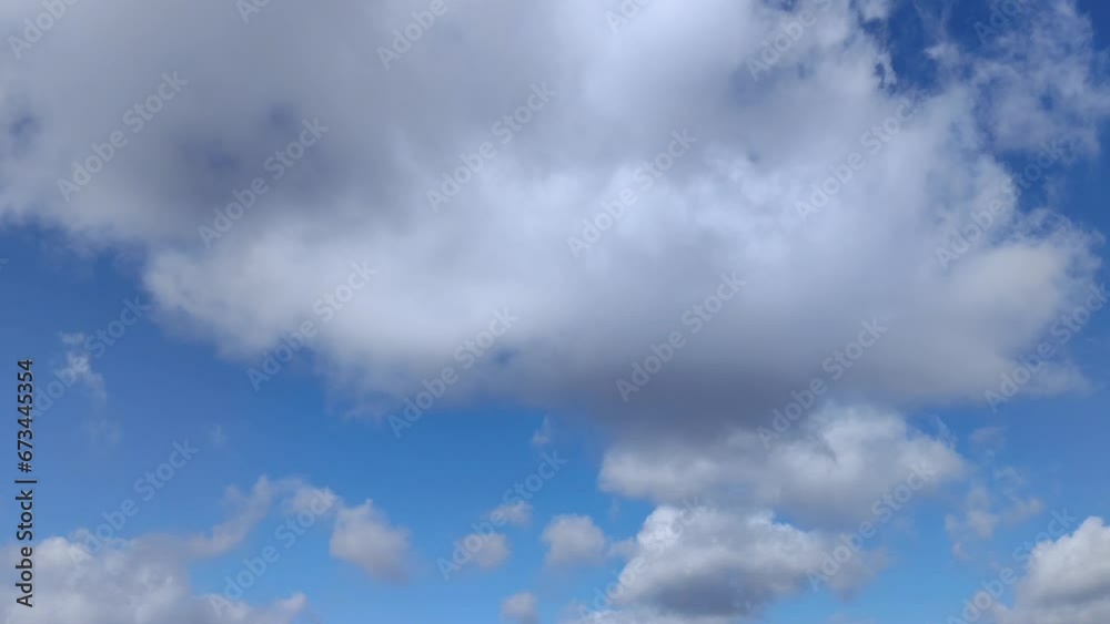 Radiant intense blue sky with clouds moving and expanding Radiant intense blue sky with clouds moving and expanding