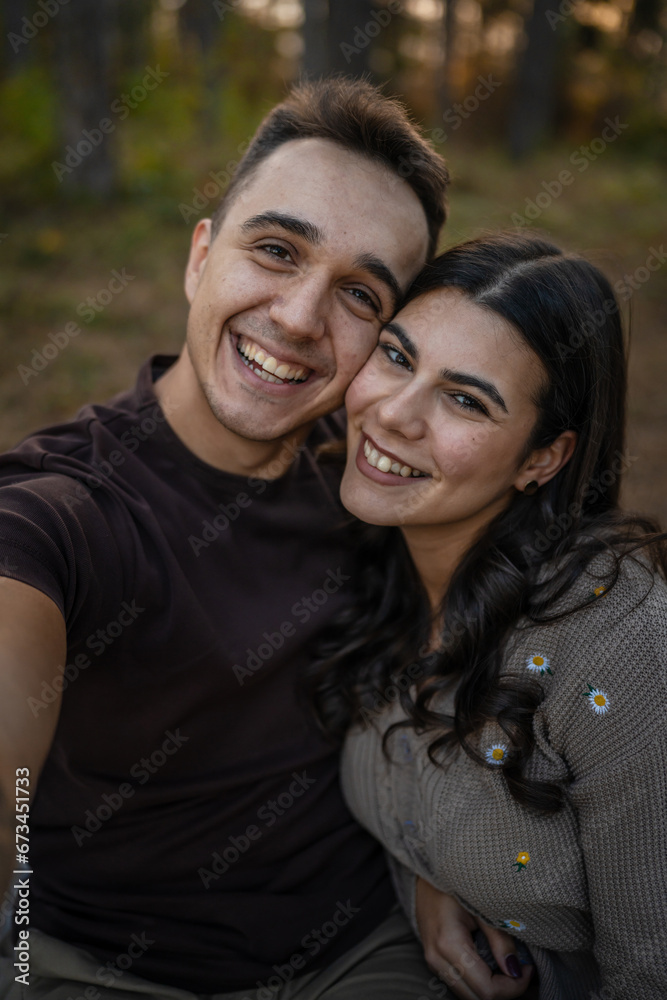 Man and woman young adult couple in nature self portrait selfie ugc Man and woman young adult couple in nature self portrait selfie ugc