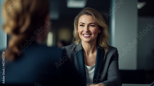 Happy middle-aged business woman, manager, office meeting. Smiling female HR hiring recruit at job interview, bank or insurance agent, lawyer making contract deal with client at work. Female therapist