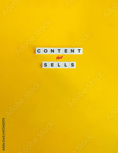 Content Selling. In-demand, High Quality Content. Concept Image. Letter Tiles on Yellow Background. Minimal Aesthetic.