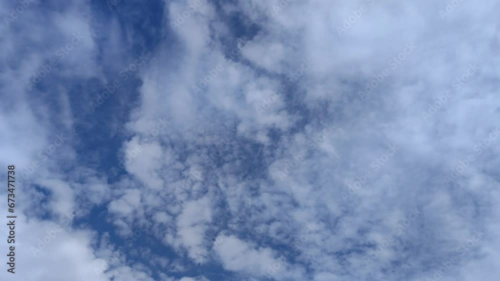 White cirrocumulus clouds moving in the morning White cirrocumulus clouds moving in the morning