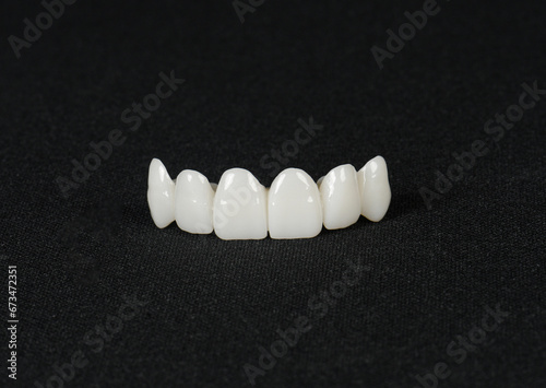 Zircon dentures on a dark background