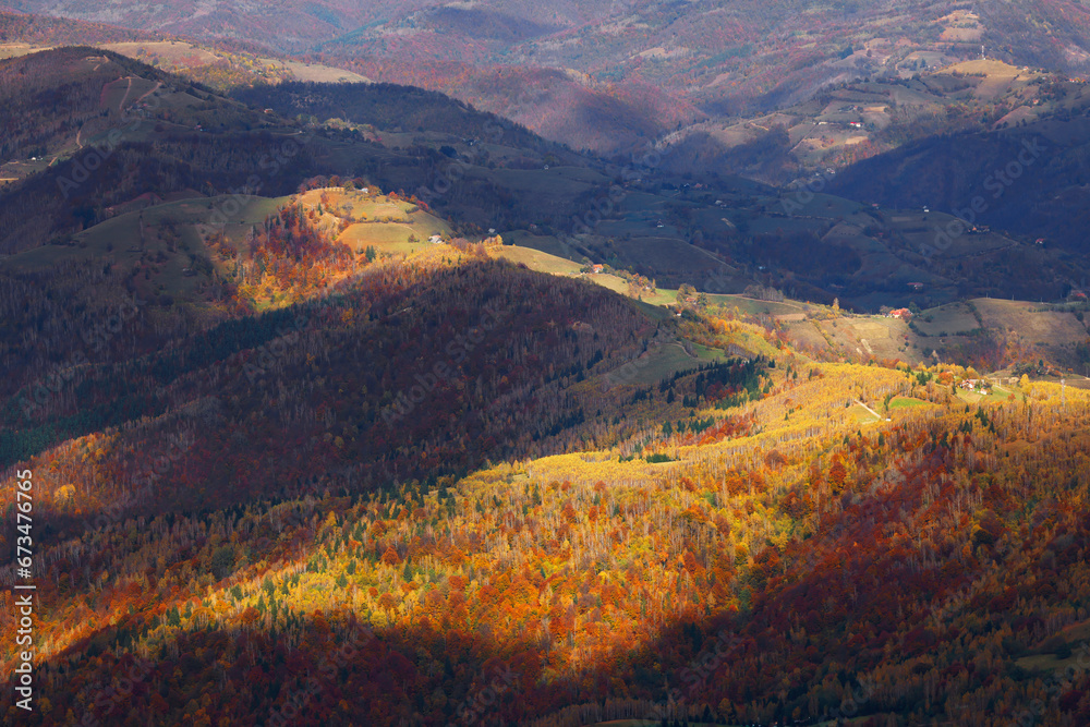 Autumn colours in Apuseni mountains, Occidental Carpathians of Romania, Europe. Warm autumn colours on a sunny day