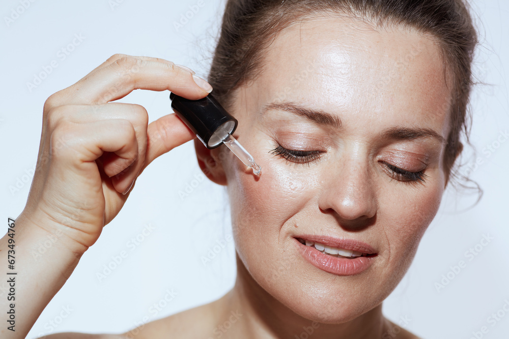 relaxed modern female with cosmetic elixir relaxed modern female with cosmetic elixir