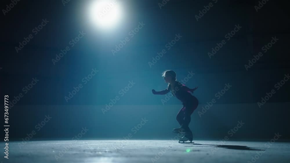 Amazing Jump Of Young Female Figure Skater, Slow Motion Shot, Professional Sport And Ice Show Amazing Jump Of Young Female Figure Skater, Slow Motion Shot, Professional Sport And Ice Show