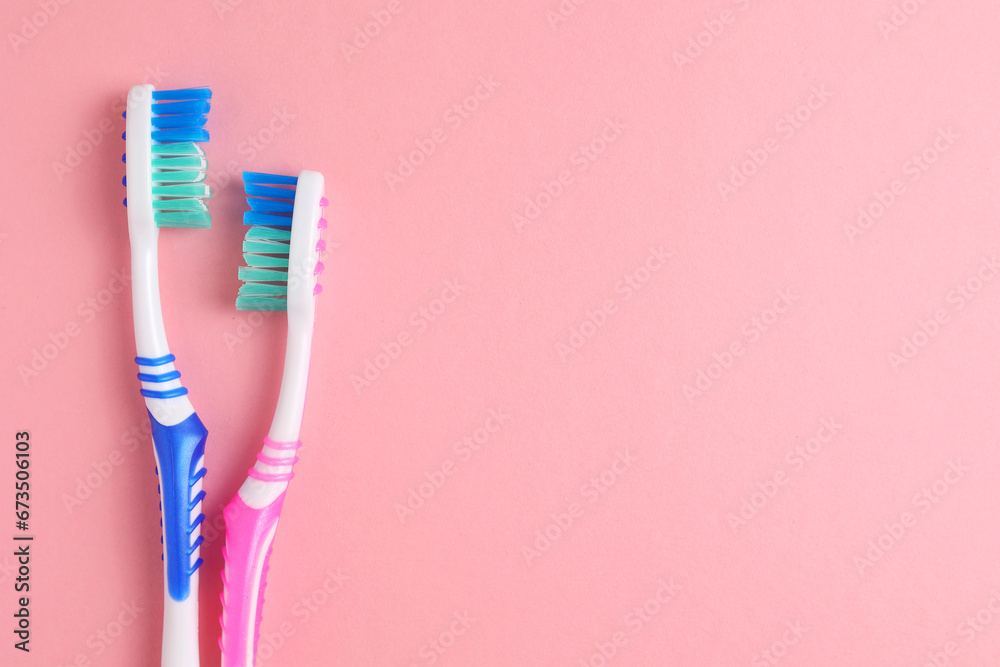 Different toothbrushes on a colored background. Dental care, oral health. Different toothbrushes on a colored background. Dental care, oral health.