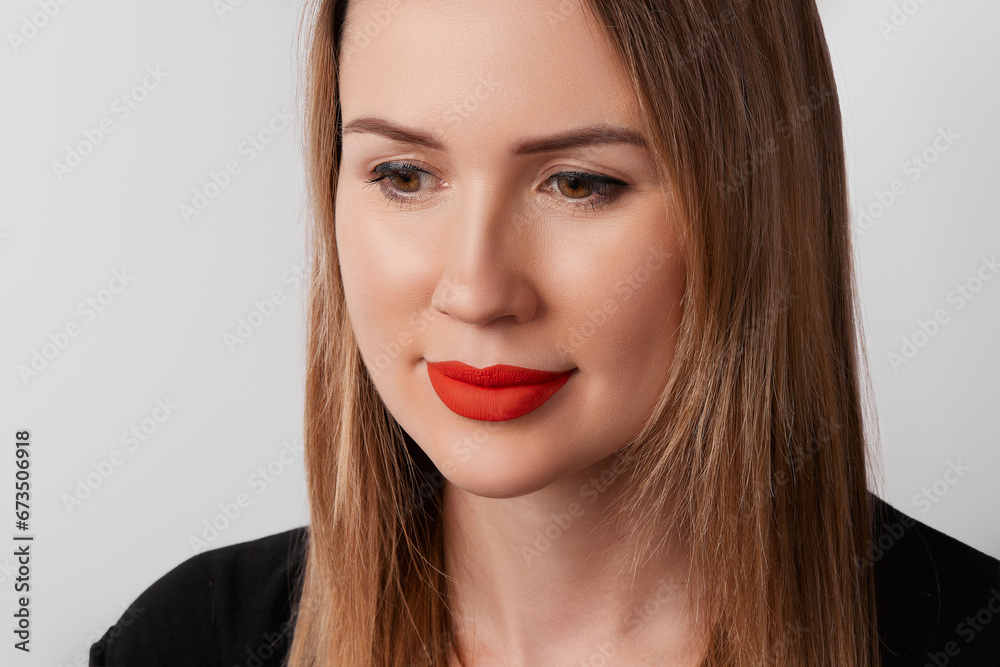 Close up womans face with plump lips with red matt lipsick. Beauty fashion portrait personal make up Close up womans face with plump lips with red matt lipsick. Beauty fashion portrait personal make up