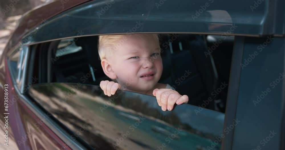 Baby Inside The Car, Close-Up View Baby Inside The Car, Close-Up View