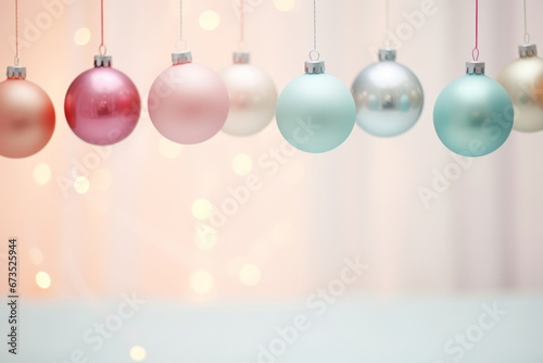 Pastel pink background with Christmas decorations. The concept of the winter holidays   Xmas and New Year. Bright pastel rainbow colors.