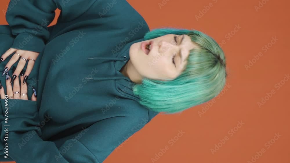 Vertical video of Young woman experiencing stomachache. Vertical video of Young woman experiencing stomachache.