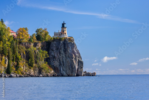 Split Rock Lighthouse - A lighthouse on a cliff along Lake Superior in autumn.