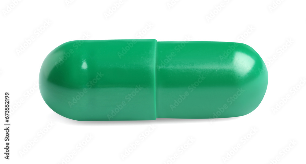 One green pill on white background. Medicinal treatment One green pill on white background. Medicinal treatment