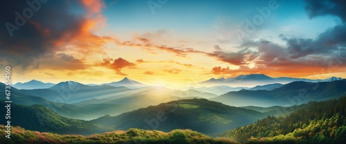Mountain panorama during sundown. Beautiful natural panoramic landscape in the summer time © eye-catching