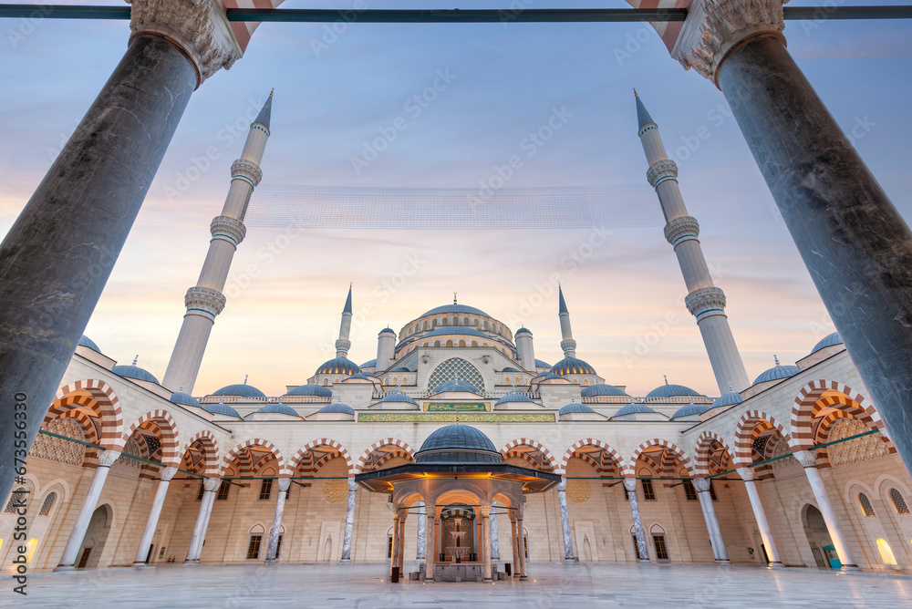 Fototapeta premium Sunset shot of Courtyard of Grand Camlia Mosque, or Buyuk Camlica Camii, a modern Islamic complex, built in 2019, located in Camlica hill in Uskudar district, Istanbul, Turkey