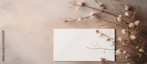Mockup of a card for a wedding or birthday invitation featuring a table setting adorned with branches The card is blank for customization Additionally there is a concept for a restaurant me