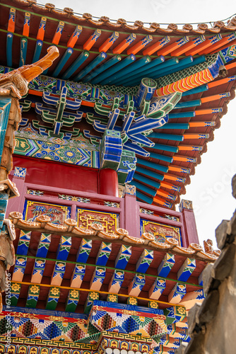 Roof decorations and architectural details at Da Zhao or Wuliang temple, China. photo