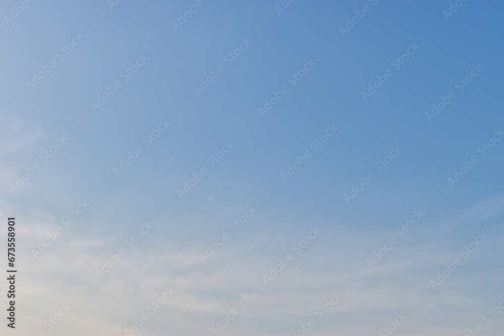Fototapeta premium beautiful blue sky and cloud with golden ray sunrise in the morning, natural background