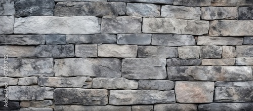Pattern of weathered grimy grey bricks