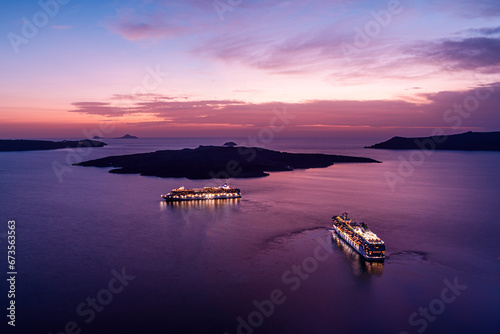 Purple sunset over the sea with ships