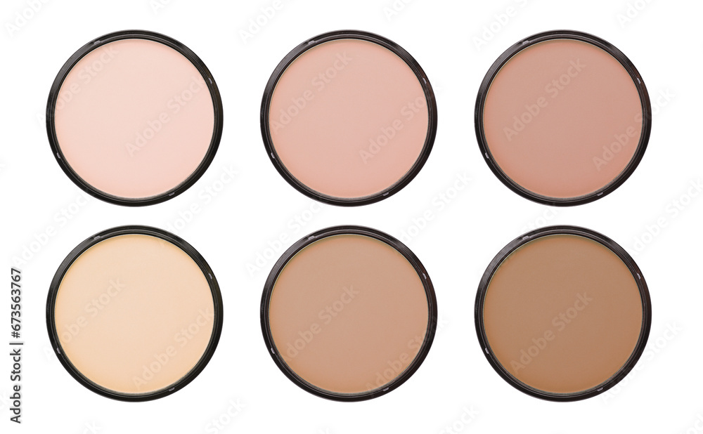 Compact face powders of different shades isolated on white, collection. Top view Compact face powders of different shades isolated on white, collection. Top view